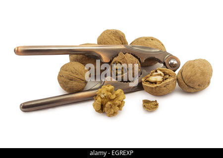 nutcracker and walnuts on a white background Stock Photo