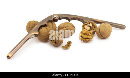 nutcracker and walnuts on a white background Stock Photo
