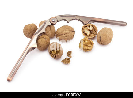nutcracker and walnuts on a white background Stock Photo