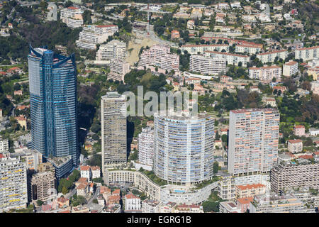 AERIAL VIEW. Luxurious high-rise apartments, the tallest on the left is the Odeon Tower (171m). Ward of la Rousse Saint Roman, Principality of Monaco. Stock Photo