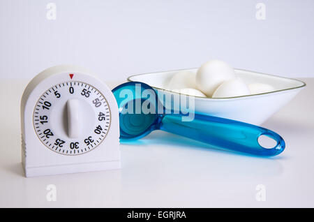 Kitchen egg timer and  tools for boiling eggs Stock Photo