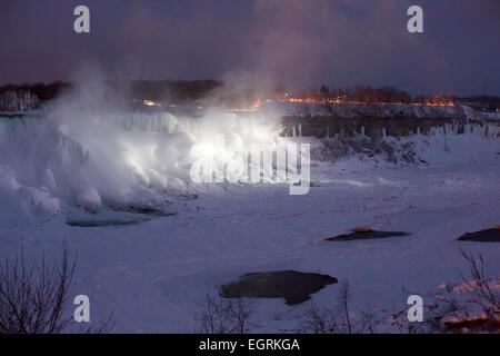 Niagara Falls, Ontario - Niagara Falls in winter. The American Falls is heavily coated in ice. Stock Photo