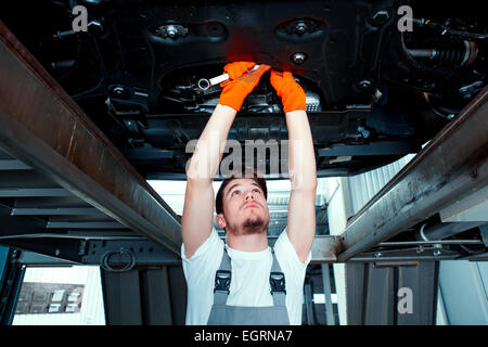 Car mechanic at the service station Stock Photo
