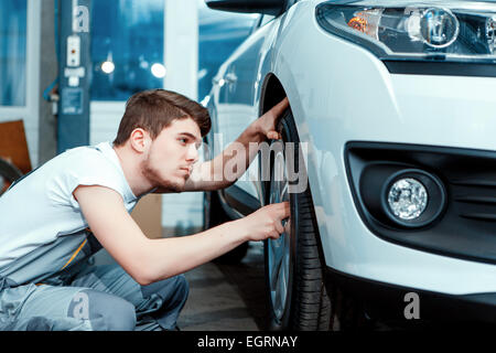 Car mechanic at the service station Stock Photo