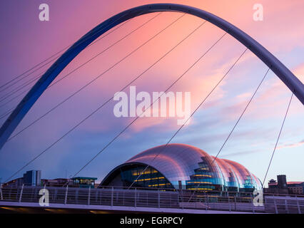 Newcastle upon Tyne, UK. 1st March, 2015. UK Weather: Sage Gateshead building and Millennium bridge at sunset on a clear and chilly end to 1st March in Newcastle upon Tyne. Image taken from Newcastle Quayside on the north side of the river Tyne. Credit:  ALANDAWSONPHOTOGRAPHY/Alamy Live News Stock Photo