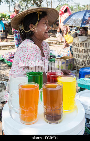 At fruit and vegetable market next to  train tracks, 3 hour circle train ride through Yangon and suburbs Yangon,Rangoon,Myanmar, Stock Photo