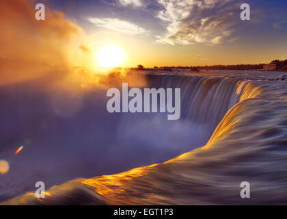 License available at MaximImages.com - Brink of Niagara Falls Canadian Horseshoe beautiful sunrise scenery. Niagara Falls, Ontario, Canada. Stock Photo