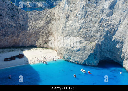 Top view on Navagio bay. Summer coastline view (Greece, Zakynthos, Ionian Sea). All peoples unrecognizable. Stock Photo