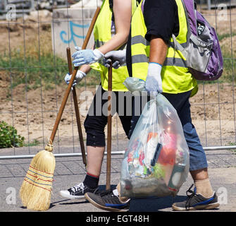 Street sweepers collecting trash Stock Photo
