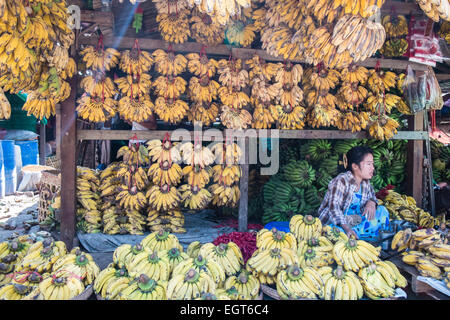 At fruit and vegetable market next to  train tracks, 3 hour circle train ride through Yangon and suburbs Yangon,Rangoon,Myanmar, Stock Photo