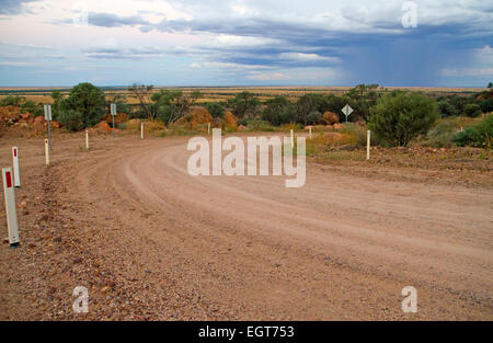 Road heading towards a rain squall near Winton Stock Photo