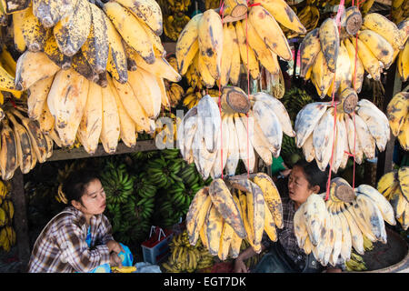 At fruit and vegetable market next to  train tracks, 3 hour circle train ride through Yangon and suburbs Yangon,Rangoon,Myanmar, Stock Photo