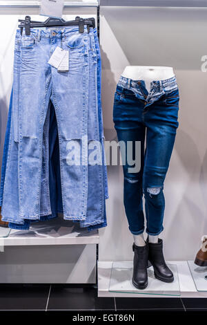 Shop Mannequin  in a clothes shop showing latest fashionable trends and styles in the clothing sector. Stock Photo