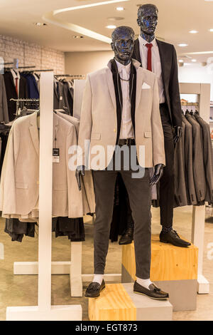 Shop Mannequin  in a clothes shop showing latest fashionable trends and styles in the clothing sector. Stock Photo