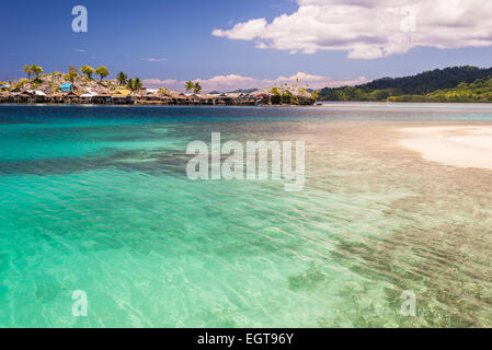 Stilt village of the Bajau, people of fishermen, aka sea gypsies, in the blue sea of the remote Togean Islands, Indonesia Stock Photo