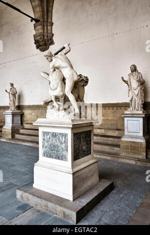 A marble statue of 'Hercules Beating the Centaur Nessus' by Giambologna (1599) in the Loggia dei Lanzi, Florence, Tuscany, Italy Stock Photo