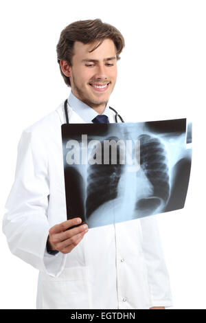 Happy doctor man examining a radiography on a white background Stock Photo