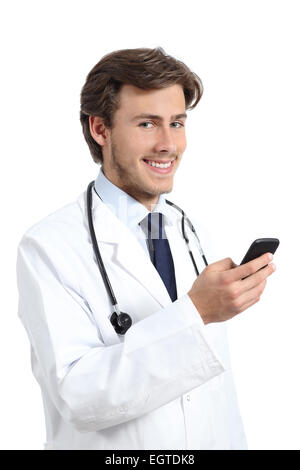 Young happy doctor holding a smart phone isolated on a white background Stock Photo