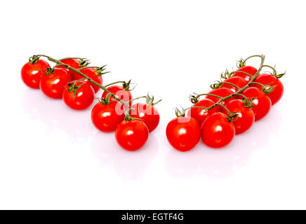 Fresh ripe cherry tomatoes on white background Stock Photo
