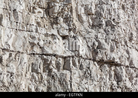 Close-up of one of the Seven Sisters chalk cliffs, showing the layers of chalk and bands of flint. Stock Photo