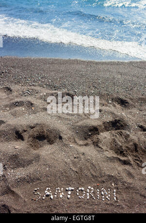 Text Santorini made with pumice stones on the volcanic beach at Kamari Stock Photo