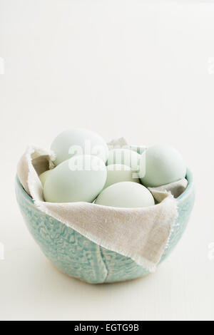 Fresh eggs for Easter in old clay plate Stock Photo - Alamy