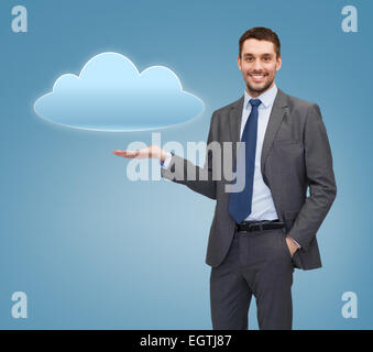 smiling businessman holding cloud icon Stock Photo