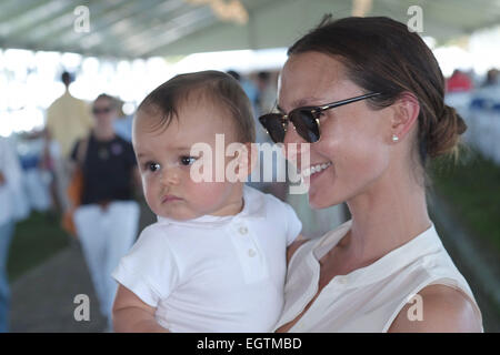 Georgina Bloomberg and son Jasper attend the Hampton Classic Horseshow Featuring: Georgina Bloomberg,Jasper Where: Bridgehampton, New York, United States When: 28 Aug 2014 Stock Photo