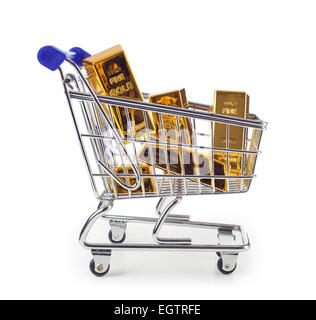 Five gold bars in shopping cart isolated on white background. Stock Photo