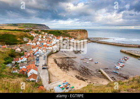 A view over the traditional fishing village of Staithes, North Yorkshire, England, United Kingdom, Europe.