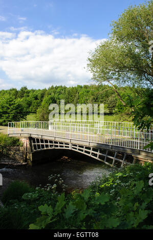 Cantlop Bridge (Built 1813) is a cast Iron single span road bridge over the Cound Brook, Cantlop, Shropshire. Stock Photo