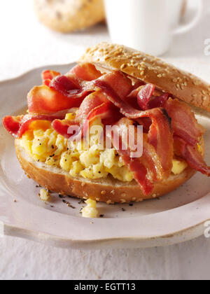 Crispy backon and scrambled eggs on a bagel Stock Photo