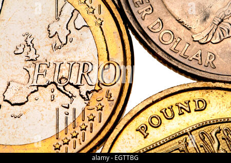 Euro, pound and quarter dollar coins Stock Photo