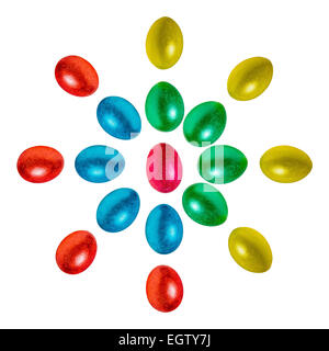 Easter eggs flower, sun or mandala isolated against white background. Eggs of red, blue, green, yellow and orange color Stock Photo