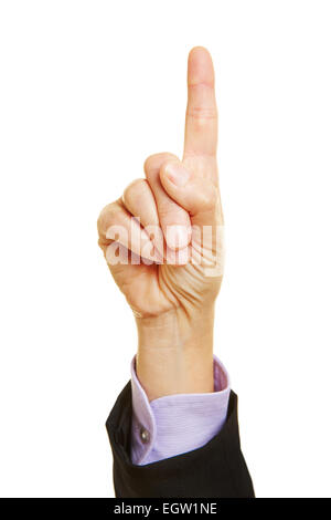Hand holding up index finger as warning gesture Stock Photo