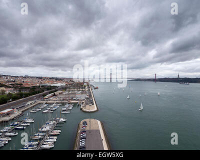 Aerial view of the Belem quarter, the Tagus river and 25th April suspension bridge in Lisbon, Portugal Stock Photo