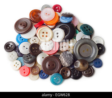 Pile of old and used clothes buttons isolated on white background Stock Photo