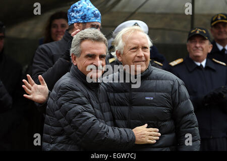 (150303) -- TIERRA DEL FUEGO, March 3, 2015 (Xinhua) -- Image provided by Chile's Defense Ministry shows Chilean Defense Minister Jorge Burgos Carela (R) and his Argentine counterpart Agustin Rossi (L) heading the ceremony of destruction of the last landmines and declaration of 'Isla Grande' free of these explosives, in the San Sebastian Border Crossing, in Tierra del Fuego, Chile, on March 2, 2015. Argentina and Chile reaffirmed on Monday the bilateral commitment with peace, during an act headed by the Defense Ministers of both countries in the southernmost of the continent, wich they declare Stock Photo