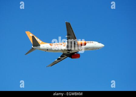 Easyjet Boeing 737-700 taking off against a blue sky. Stock Photo