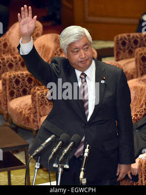 Tokyo, Japan. 3rd Mar, 2015. Japan's Defense Minister Gen Nakatani requests the chairman's permission before answering an opposition lawmaker during a budget commettee deliberation at the Diet's lower house in Tokyo on Tuesday, March 3, 2015. Stock Photo