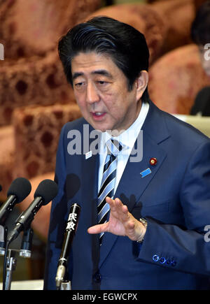 Tokyo, Japan. 3rd Mar, 2015. Japan's Prime Minister Shinzo Abe gestures as he answers an opposition lawmaker during a budget committee deliberation at the Diet's lower house in Tokyo on Tuesday, march 3, 2015. The deliberation was focused upon illegal handling of political funds by two key Cabinet ministers. Credit:  Natsuki Sakai/AFLO/Alamy Live News Stock Photo