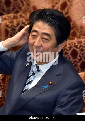 Tokyo, Japan. 3rd Mar, 2015. Japan's Prime Minister Shinzo Abe smiles during a budget committee deliberation at the Diet's lower house in Tokyo on Tuesday, march 3, 2015. The deliberation was focused upon illegal handling of political funds by two key Cabinet ministers. Credit:  Natsuki Sakai/AFLO/Alamy Live News Stock Photo