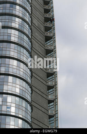 Detail of Unicredit tower with window washers in Porta Nuova, Milan, Italy Stock Photo