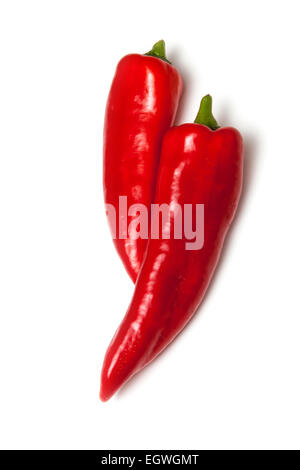 Pointed red peppers isolated on a white studio background. Stock Photo