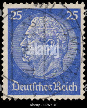 GERMANY - CIRCA 1934: A stamp printed in Germany shows portrait of Paul von Hindenburg - 2nd President of German Reich, circa 19 Stock Photo