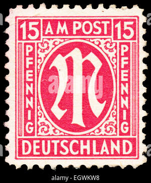 GERMANY - CIRCA 1945: A stamp printed in American-British occupation zone shows definitive stamp series 'M' in denomination of 1 Stock Photo