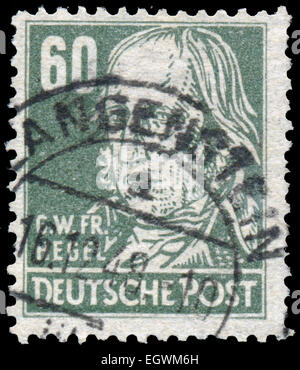 GERMANY - CIRCA 1952: Stamp printed in Germany shows portrait of Georg Wilhelm Friedrich Hegel (German philosopher), with the sa Stock Photo