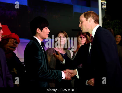 Shanghai, China. 3rd Mar, 2015. Britain's Prince William (R) shakes hands with Chinese actor Chen Xuedong, who dubbed 'Paddington', during the Chinese premiere of 'Paddington' at Shanghai Film Museum in Shanghai, east China, March 3, 2015. Credit:  Jin Liangkuai/Xinhua/Alamy Live News Stock Photo