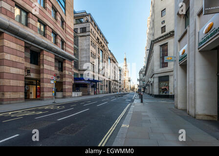 Views down Poultry in the City of London. 1 Poultry is on the left and St Mary le Bow church in the distance Stock Photo