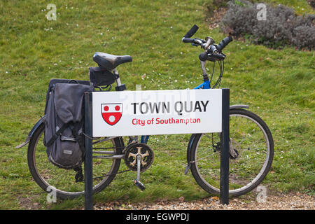 Bicycle leaning against Town Quay City of Southampton sign at Southampton, Hampshire, UK in March Stock Photo